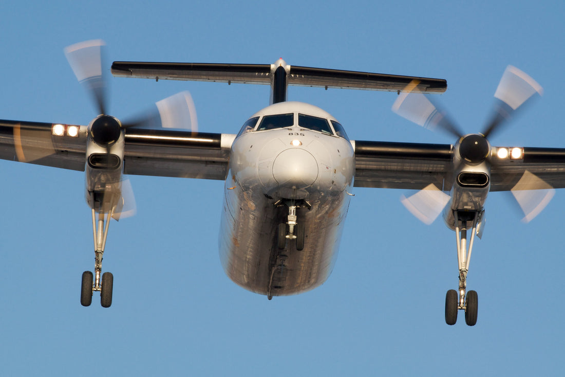 PNG Air Dash 9 coming into land