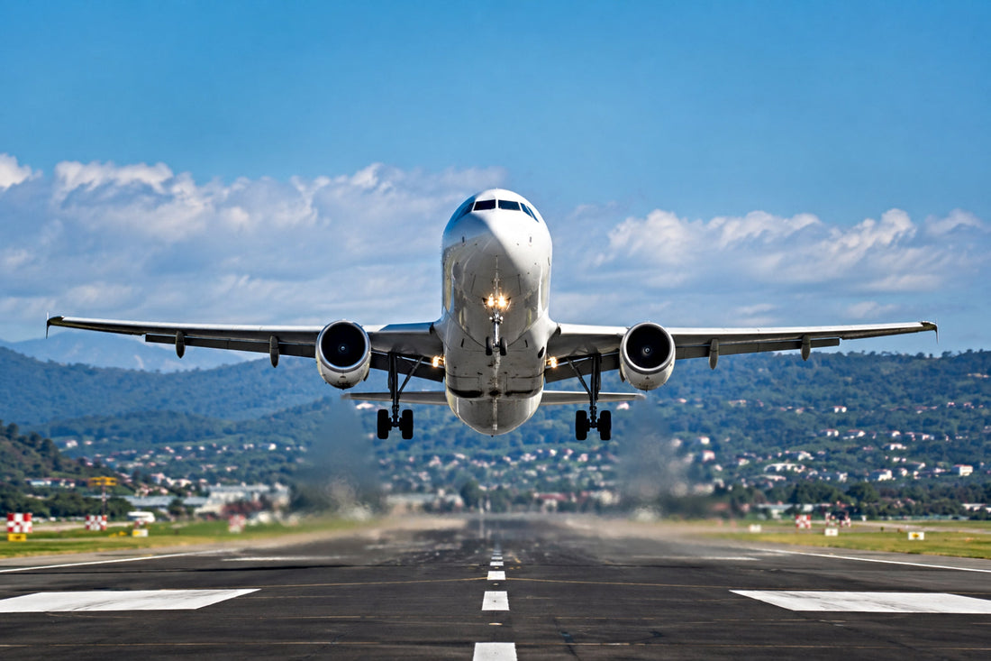 Aircraft taking off from busy airport