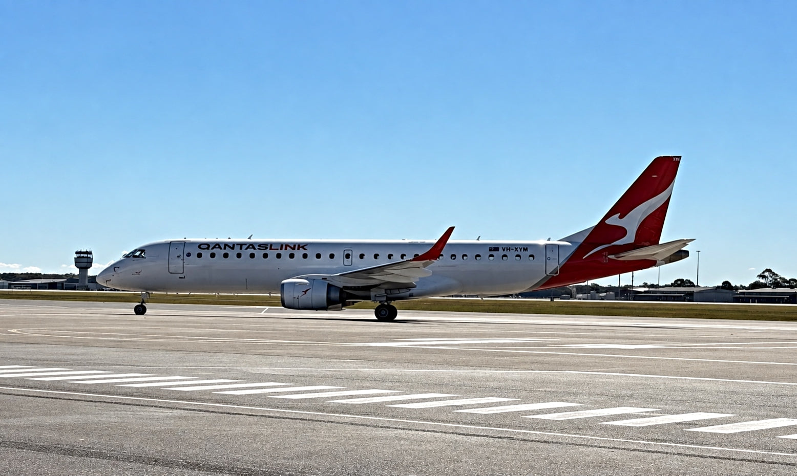 QantasLink A190-100 on apron at Newcastle Williamtown Airport